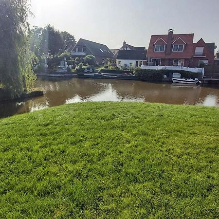 Grachtendroeoem Greetsiel Esterno foto